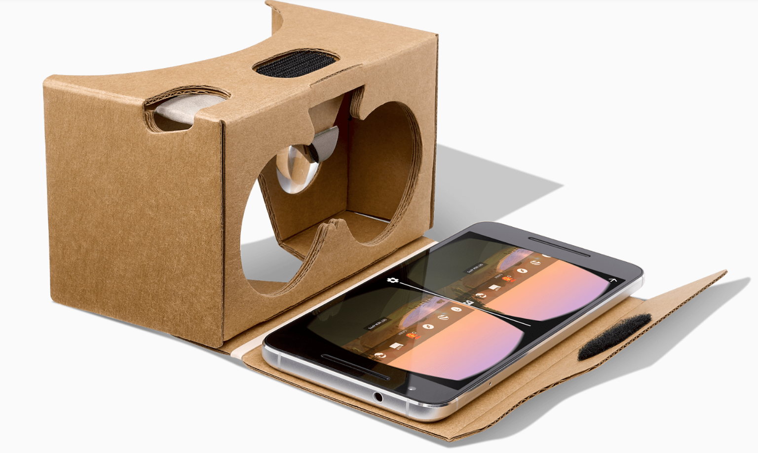 Cardboard VR headset with cellphone in pop-out section.
