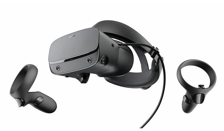 Black VR headset with two hand controllers.